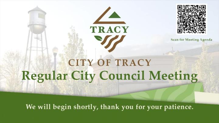 A graphic announcing a Special City Council Meeting for the City of Tracy. The background shows a soft-focus image of a large civic building framed by blooming trees. At the top is the City of Tracy logo with stylized green and brown lines. To the right is a QR code labeled “Scan for Meeting Agenda.” In the center, large text reads “City of Tracy Special City Council Meeting.” A green banner at the bottom displays the date and time: “April 7, 2026, at 7:00 p.m.”